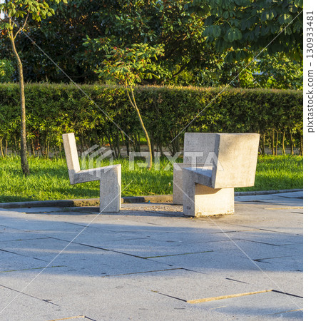 Decorative seats in the park of the city 130933481