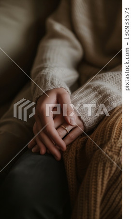 Delicate pink lotus flower gently resting on the water surface among green leaves with water droplets tranquility Delicate pink lotus flower gently resting on the water surface among green leaves with water droplets tranquility 130933573