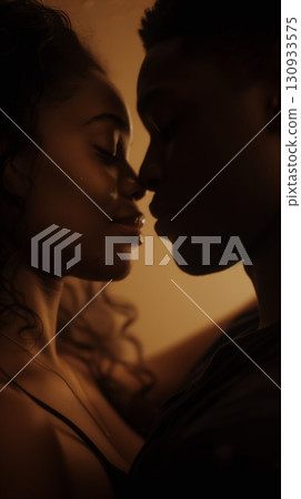 Delicate pink lotus flower gently resting on the water surface among green leaves with water droplets tranquility Delicate pink lotus flower gently resting on the water surface among green leaves with water droplets tranquility 130933575