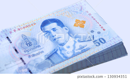 Individual counting and handling cash currency in a casual setting during the day Individual counting and handling cash currency in a casual setting during the day 130934351