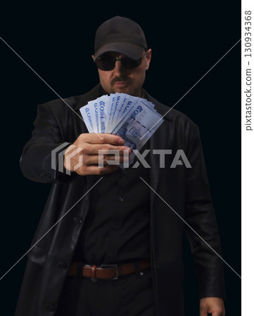 Currency exchange process in local market showing bills and transaction details 130934368