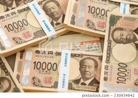New 2024 banknotes: Eiichi Shibusawa 10,000 yen bill stack and savings passbook with over 10 million yen in savings 130934642