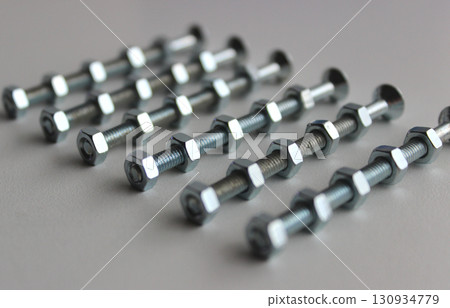 Hex Nuts On A Threaded Hex Bolts Angle View With Soft Focus Stock Photo 130934779