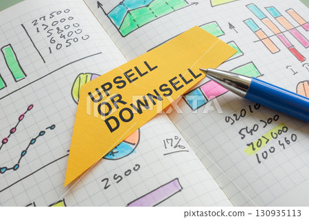 Upsell or downsell with charts. Sales strategy and business growth. Upsell or downsell with charts. Sales strategy and business growth. 130935113