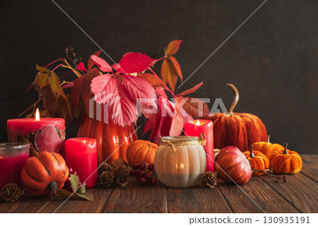 Autumn Still Life with Pumpkins, Candles and Seasonal Decorations Autumn Still Life with Pumpkins, Candles and Seasonal Decorations 130935191