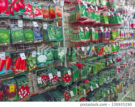 Seed packets on shelves in garden store. Seeds are sold in the agricultural store 130935290