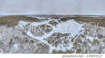 Aerial View of Ski slopes on Mount Uktus, Yekaterinburg, Ural, Russia. Aerial View of the Ski Resort in Mountains at Winter. Aerial view of ski elevator. Aerial View of Ski slopes on Mount Uktus, Yekaterinburg, Ural, Russia. Aerial View of the Ski Resort in Mountains at Winter. Aerial view of ski elevator. 130935517
