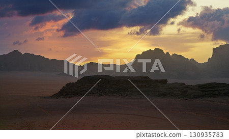 Beautiful sunset over desert mountains highlighting nature's beauty and need for conservation Beautiful sunset over desert mountains highlighting nature's beauty and need for conservation 130935783