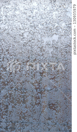 Winter pattern. Texture winter background. Patterned texture from frozen water Winter pattern. Texture winter background. Patterned texture from frozen water 130935979