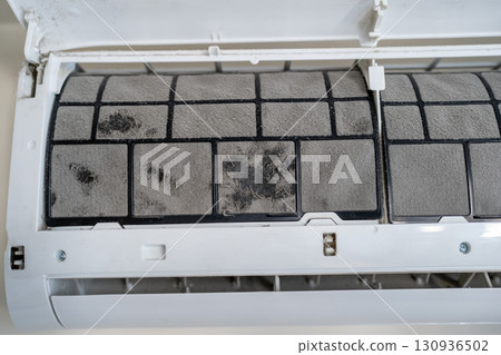 Dirty air conditioner filter in dust, untimely cleaning, maintaining and service of appliance. 130936502