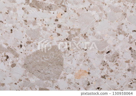 Neutral stone surface showcasing natural patterns and textures in a light color palette for interior 130938064