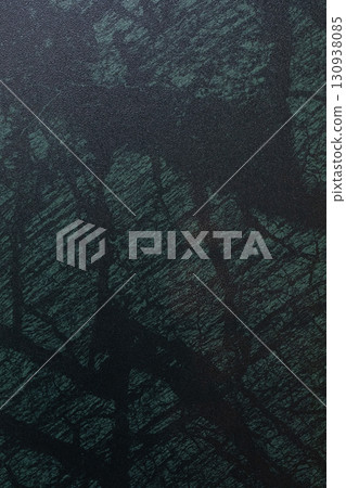 Dark textured surface resembling natural patterns in a forest or stone, evoking an organic Dark textured surface resembling natural patterns in a forest or stone, evoking an organic 130938085
