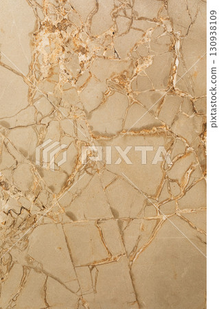 Elegant beige marble surface with intricate veining patterns found in modern interior design and 130938109