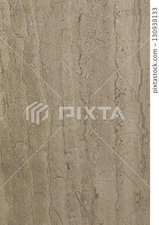 Textured surface showing layers of light brown, beige, and cream colors with unique patterns and Textured surface showing layers of light brown, beige, and cream colors with unique patterns and 130938133