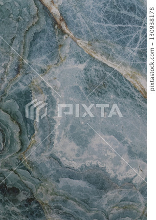 Beautiful blue stone surface with intricate patterns and textures found in natural formations 130938178