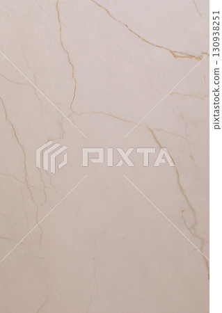 Elegant light beige marble with subtle golden veins enhances modern interior spaces 130938251