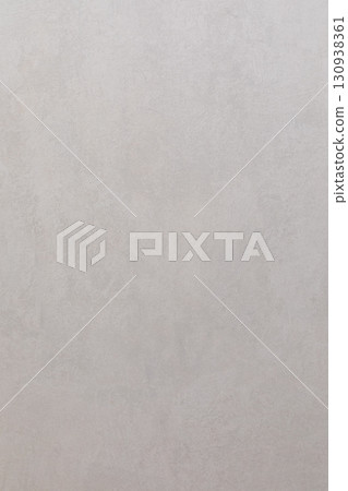 Soft, textured wall background with subtle variations in color and tone suitable for various design 130938361