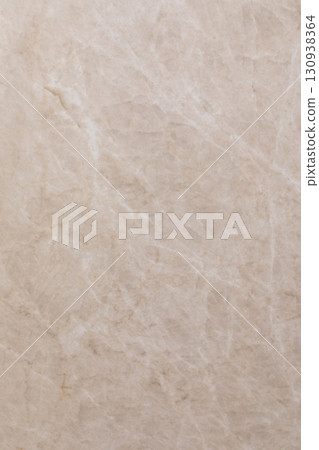 Natural beige marble surface with subtle veining pattern for home decor and design purposes Natural beige marble surface with subtle veining pattern for home decor and design purposes 130938364