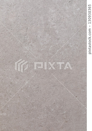 Close-up view of light gray concrete texture showing subtle variations in color and pattern during Close-up view of light gray concrete texture showing subtle variations in color and pattern during 130938365
