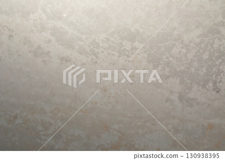 Smooth, textured surface of light gray stone with subtle variations in color and pattern visible Smooth, textured surface of light gray stone with subtle variations in color and pattern visible 130938395