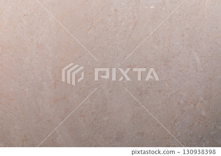 Elegant beige marble surface with subtle texture viewed in natural light 130938398
