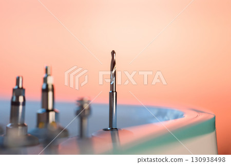 Full set of dental implant drill bits in surgical tray, close-up of professional dentistry equipment 130938498