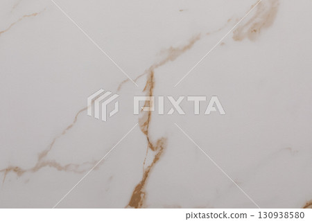 Elegant white marble with gold veins showcasing natural beauty and intricate designs found in Elegant white marble with gold veins showcasing natural beauty and intricate designs found in 130938580