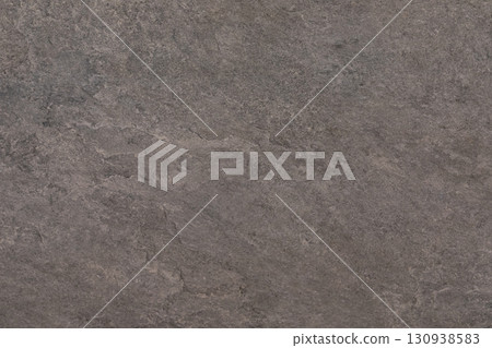 Surface of textured stone showing fine details and natural variations in color and pattern in a Surface of textured stone showing fine details and natural variations in color and pattern in a 130938583