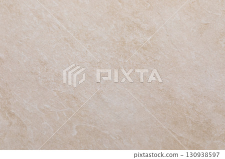 Light beige stone with subtle texture suitable for various interior designs and flooring options Light beige stone with subtle texture suitable for various interior designs and flooring options 130938597