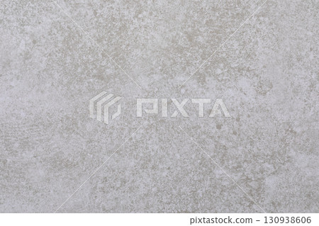 Textured gray surface with subtle patterns suitable for backgrounds or decorative purposes in Textured gray surface with subtle patterns suitable for backgrounds or decorative purposes in 130938606
