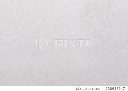 Smooth light gray surface with subtle texture on a neutral background in natural light setting Smooth light gray surface with subtle texture on a neutral background in natural light setting 130938647