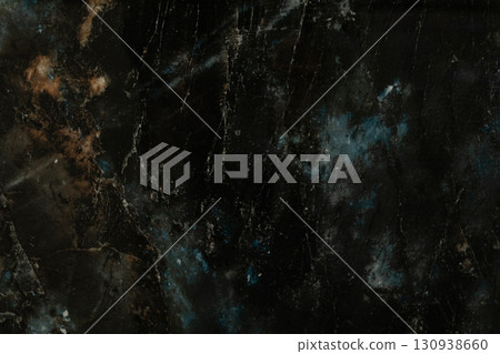 Dark marble texture with unique patterns and colors for background or design purposes 130938660