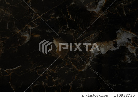 Dark marble surface showing unique natural patterns and textures suitable for various design Dark marble surface showing unique natural patterns and textures suitable for various design 130938739