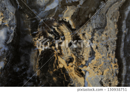 Abstract patterns and textures in a natural stone resembling intricate geological formations at Abstract patterns and textures in a natural stone resembling intricate geological formations at 130938751