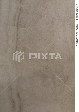 Surface with subtle textures and tones showcasing earthy colors in a natural setting 130938814