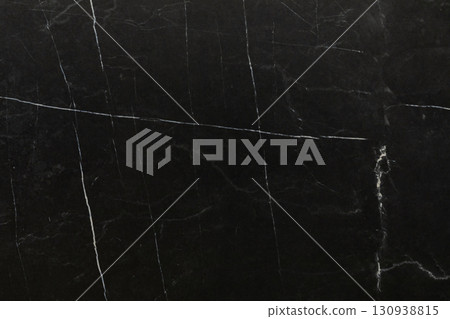 Textured black marble with white veins showcasing natural patterns and elegance for interior design 130938815