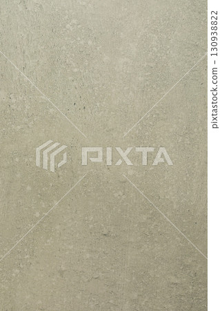 Textured wall surface with subtle patterns and earthy tones in a well-lit environment during 130938822
