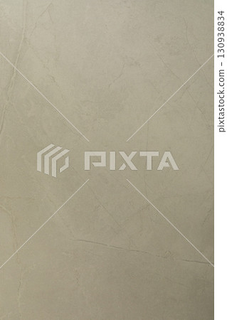 Smooth, light-colored surface with subtle texture and fine lines observed in natural light Smooth, light-colored surface with subtle texture and fine lines observed in natural light 130938834