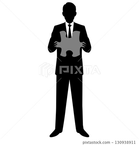 男商人拿著一塊拼圖 130938911