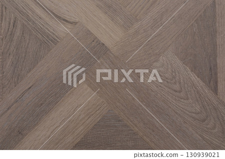 Wooden floor pattern with light and dark shades in a modern design for home interiors 130939021