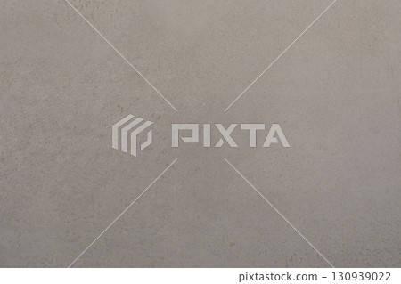 Smooth, light gray textured wall surface perfect for modern decor and background settings Smooth, light gray textured wall surface perfect for modern decor and background settings 130939022