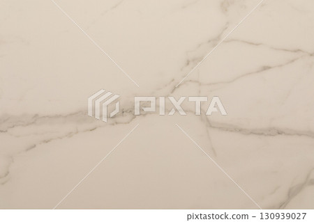 Elegant white marble surface with subtle gray veining for interior design and decor projects Elegant white marble surface with subtle gray veining for interior design and decor projects 130939027
