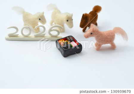 Wool felt horse and New Year's dishes Wool felt horse and New Year's dishes 130939670