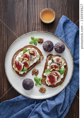 Sandwiches with figs, cream cheese, basil and honey Sandwiches with figs, cream cheese, basil and honey 130939827