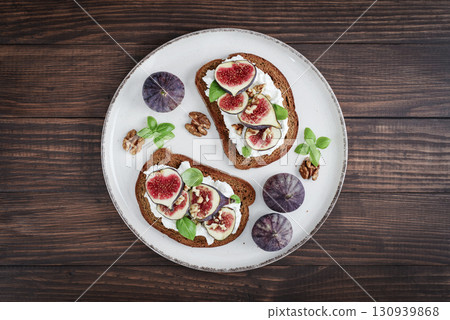 Sandwiches with figs, cream cheese, basil and honey Sandwiches with figs, cream cheese, basil and honey 130939868