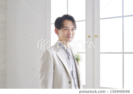 Groom portrait Groom portrait 130940046