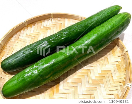 3 fresh cucumbers that have grown thick, long, and large 3 fresh cucumbers that have grown thick, long, and large 130940381