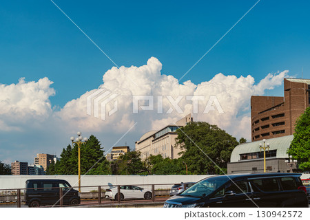 Tokyo Cityscape: Traffic and cumulonimbus clouds near Yotsuya Station, September 2025, Film-like 130942572