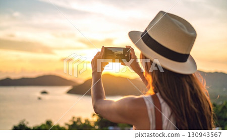 A person who shoots with a smartphone 130943567