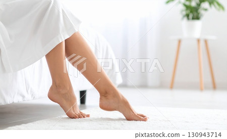 Young women's feet 130943714